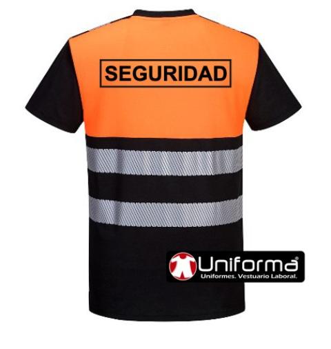 Camiseta de trabajo de alta visibilidad naranja flúor combinada con negro, con bandas reflectantes, personalizada con logo de empresa en uniforma