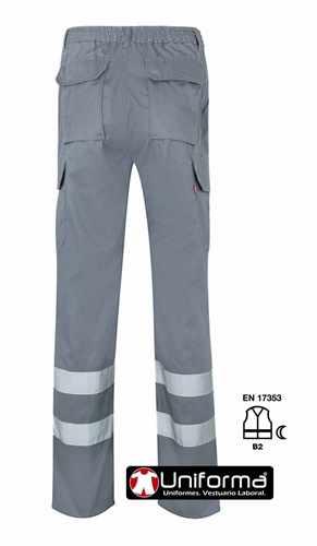 Pantalón de trabajo gris con bandas o cintas reflectantes de alta visibilidad personalizable con logo de empresa en uniforma