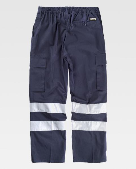 Pantalón de trabajo de color azul marino de 100% Algodón con Bandas Reflectantes grises de alta visibilidad en las perneras, personalizable con logo de empresa en uniforma - TB1447
