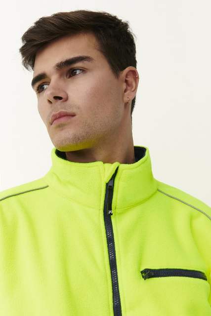 Chaqueta tipo polar con cierre de cremallera completa reflectante de alta visibilidad modelo fit que sienta bien, holgado, de calidad superior, personalizable para empresas en uniforma, de color amarillo y marino, marca monza