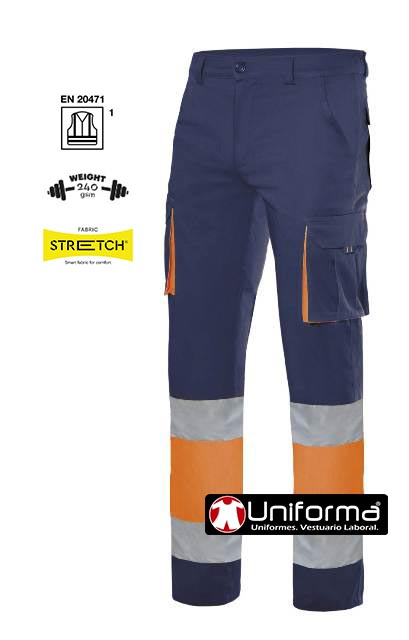 Pantalón de trabajo Elástico de Alta Visibilidad En ISO 20471 clase 1, de diseño bicolor, con detalles de color a contraste en las vistas de los bolsillos, de tejido de gramaje alto de 240 grms y resistente, tejido stretch con fibras elásticas que lo hace muy cómodo,  personalizable con logo de empresa en uniforma - V303002S